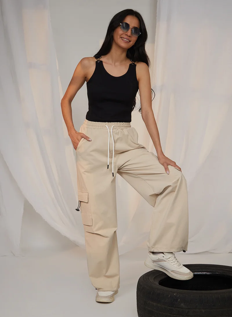 Pinacolada  Women's Beige Solid Cargo Parachute Trousers For Casual Wear | Mid-Rise | 4 Pockets | Drawstring Closure | Cargo Pants Designed With Comfortable Fit For Woman & Girls for Women | Best Price UAE